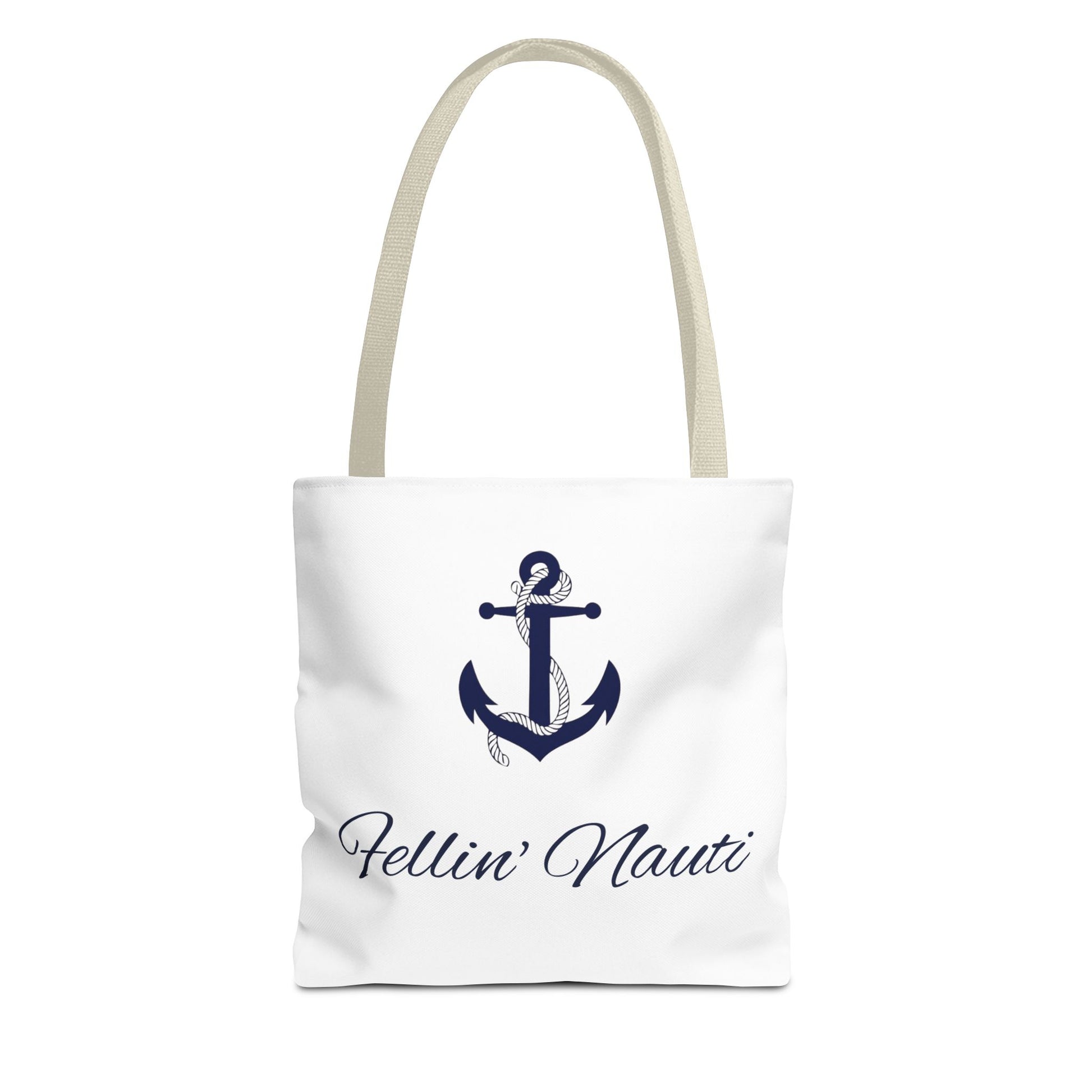 A white canvas tote bag with beige shoulder straps, featuring a navy blue anchor graphic and the script text 'Fellin' Nauti' printed on the front, set against a plain white background.