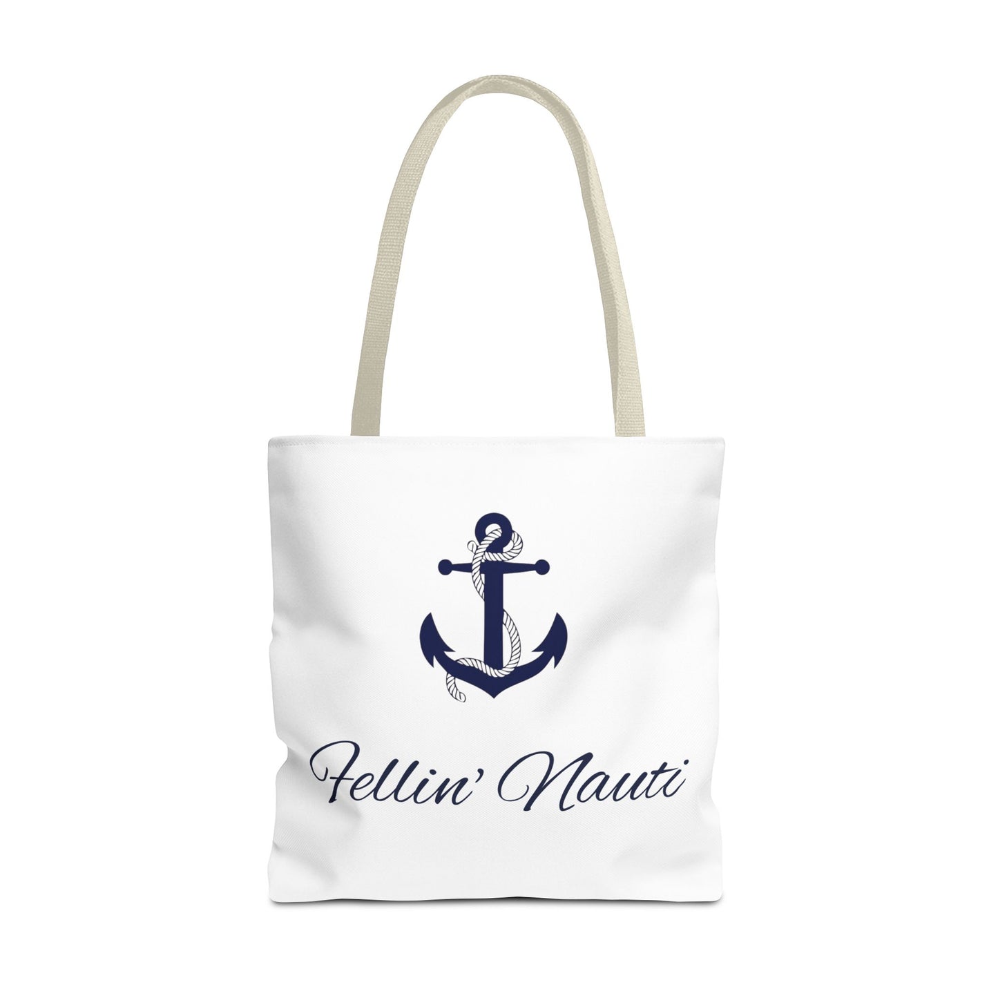 A white canvas tote bag with beige shoulder straps, featuring a navy blue anchor graphic and the script text 'Fellin' Nauti' printed on the front, set against a plain white background.