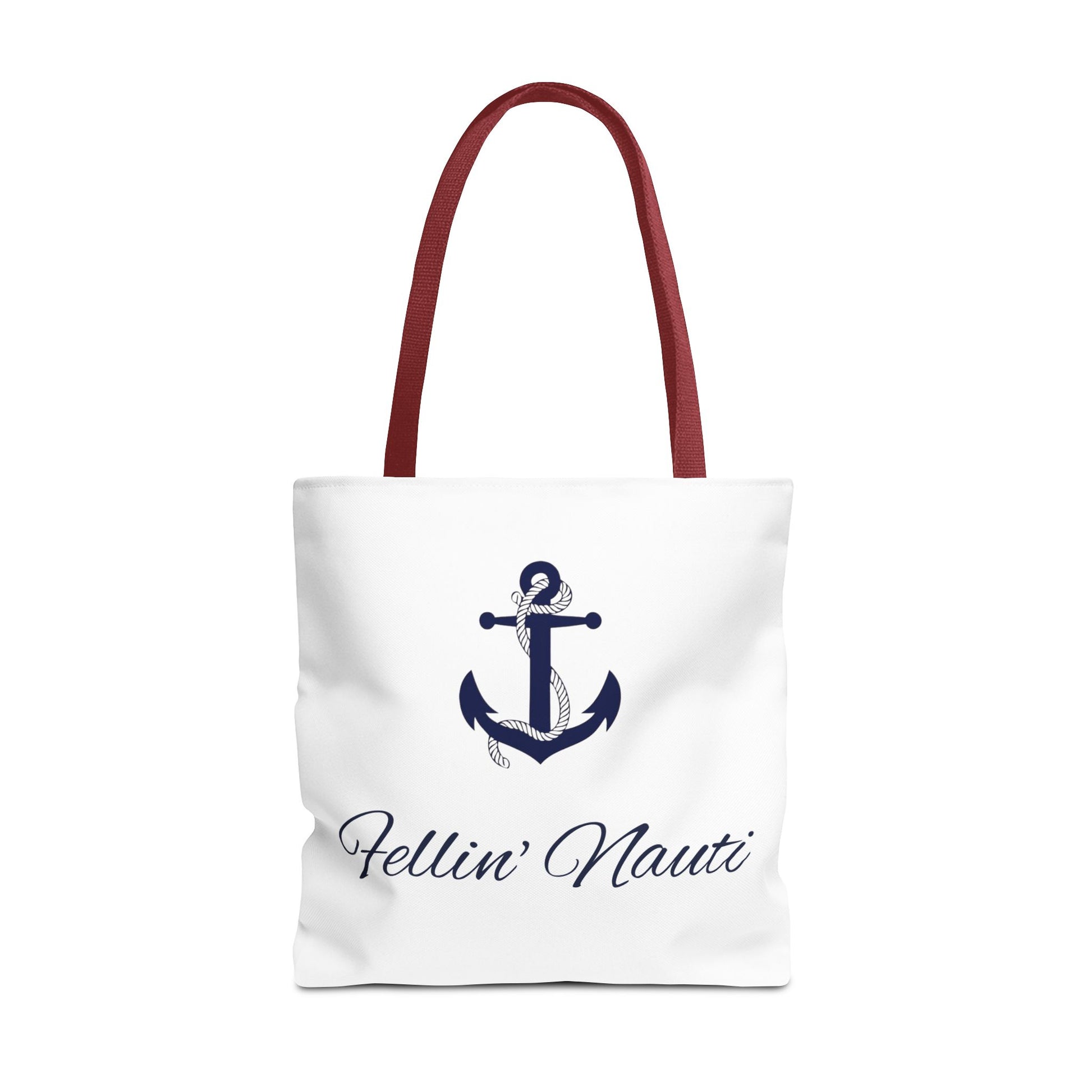A white canvas tote bag with dark red handles, featuring a navy blue anchor graphic and the script text 'Fellin' Nauti' printed on the front, set against a plain white background.